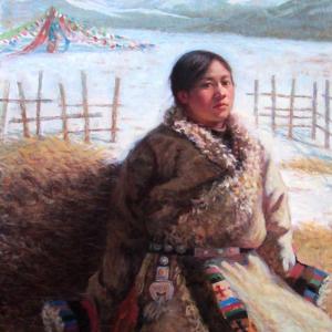 草垛上的藏族女孩