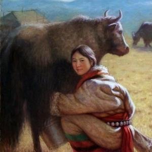 挤牛奶的藏族姑娘