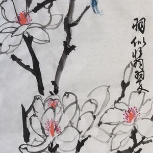 羽似翡翠，花如玉